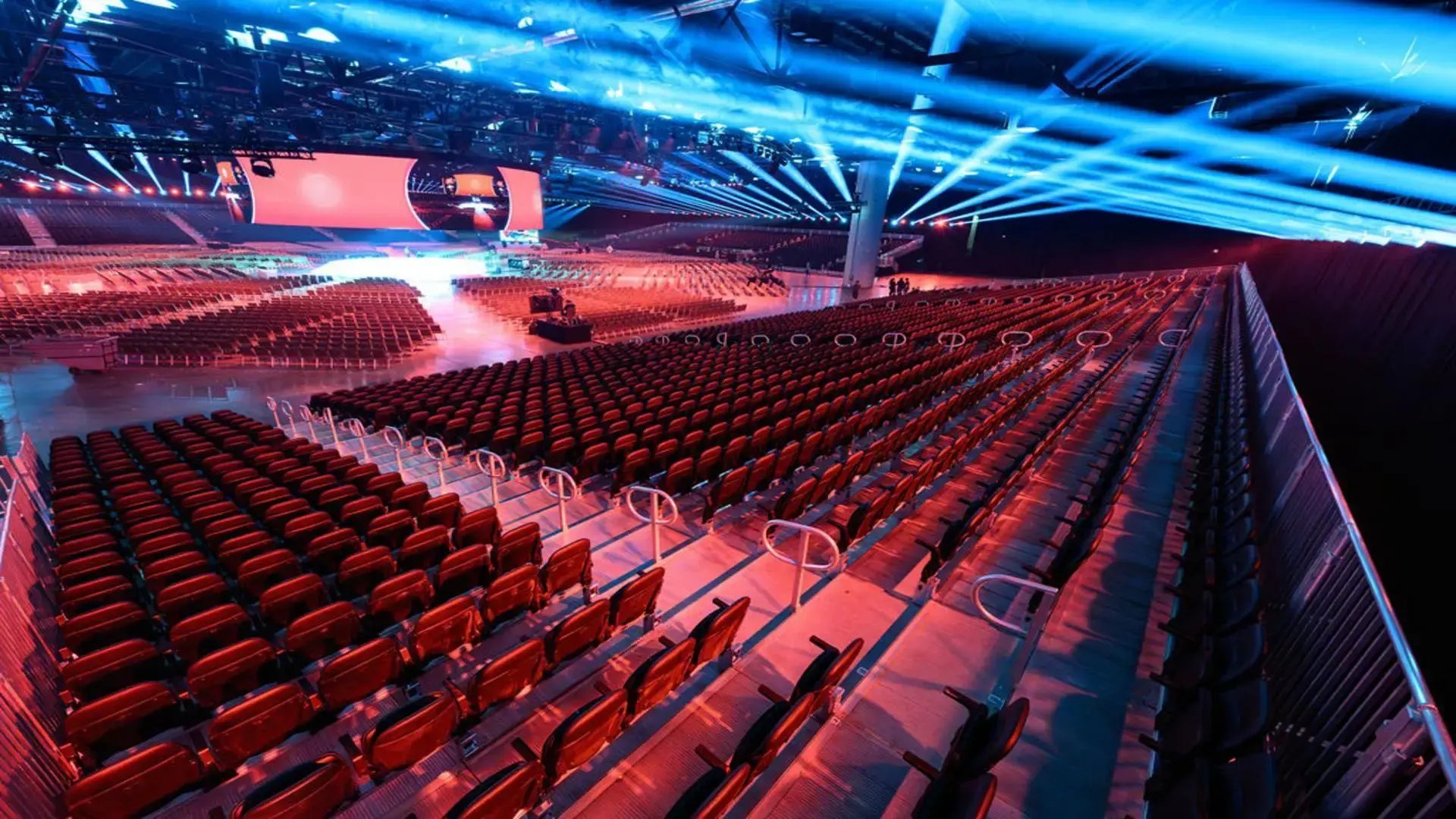 InProduction raised VIP seating with tip-up chairs arranged for clear sightlines and enhanced attendee comfort at the Brand Apart event.