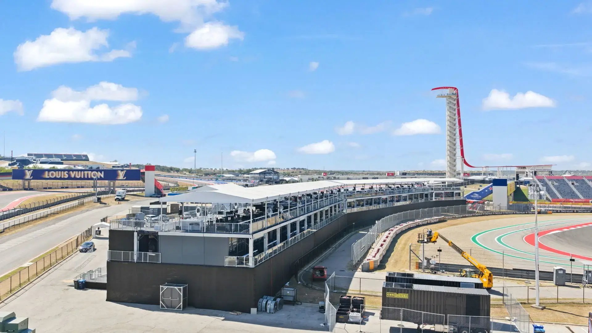 InProduction multi-level hospitality structure installed along the track at Circuit of The Americas for Formula 1, providing premium vantage points with sweeping views and contemporary modular design.