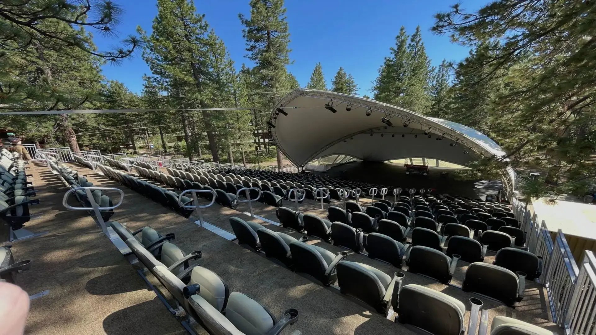 InProduction seating installation for the Classical Tahoe Music Festival, configured to follow the lakeside terrain and provide clear sightlines and strong acoustics in an intimate concert setting.
