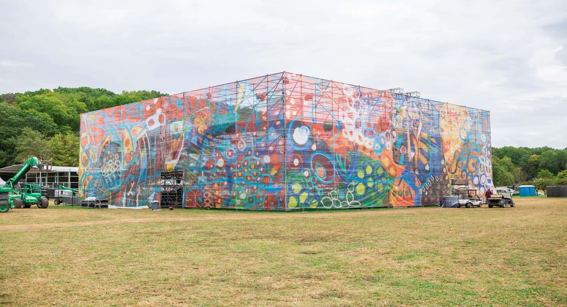 InProduction colored mesh scenic treatments installed at FORMAT Music Festival to enhance brand presence across structures and sightlines.