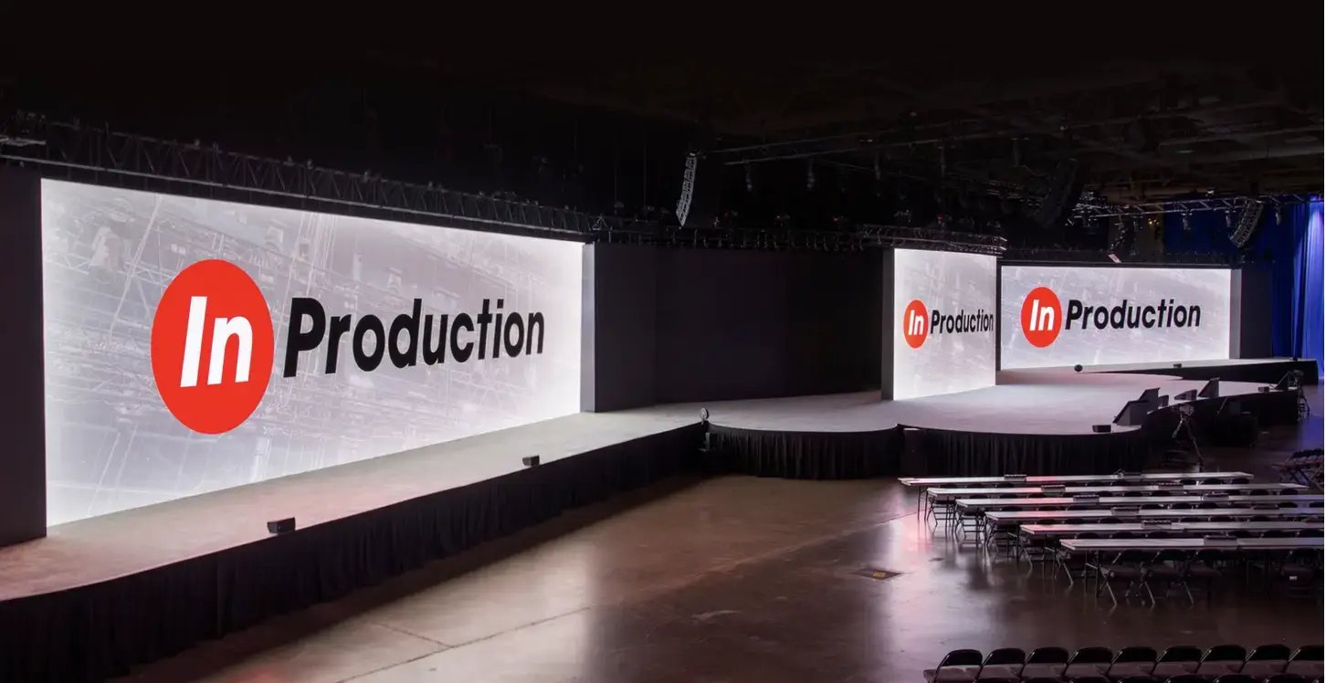 InProduction stage environment at the Kay Bailey Hutchison Convention Center designed to highlight presenters with clear sightlines and strong visual focus.