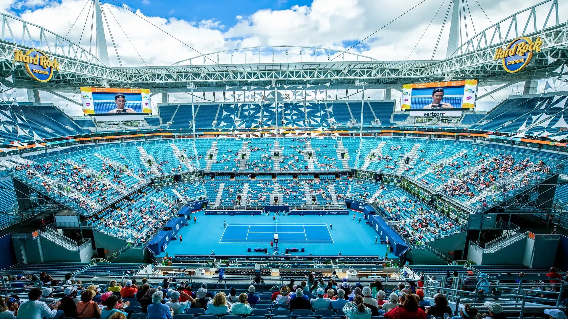 Each year, the interior of Hard Rock Stadium is transformed into a full stadium court, complete with 6,000 custom-colored seats, premium front-row and suite chairs, and mid-level suites supported by modular press boxes.