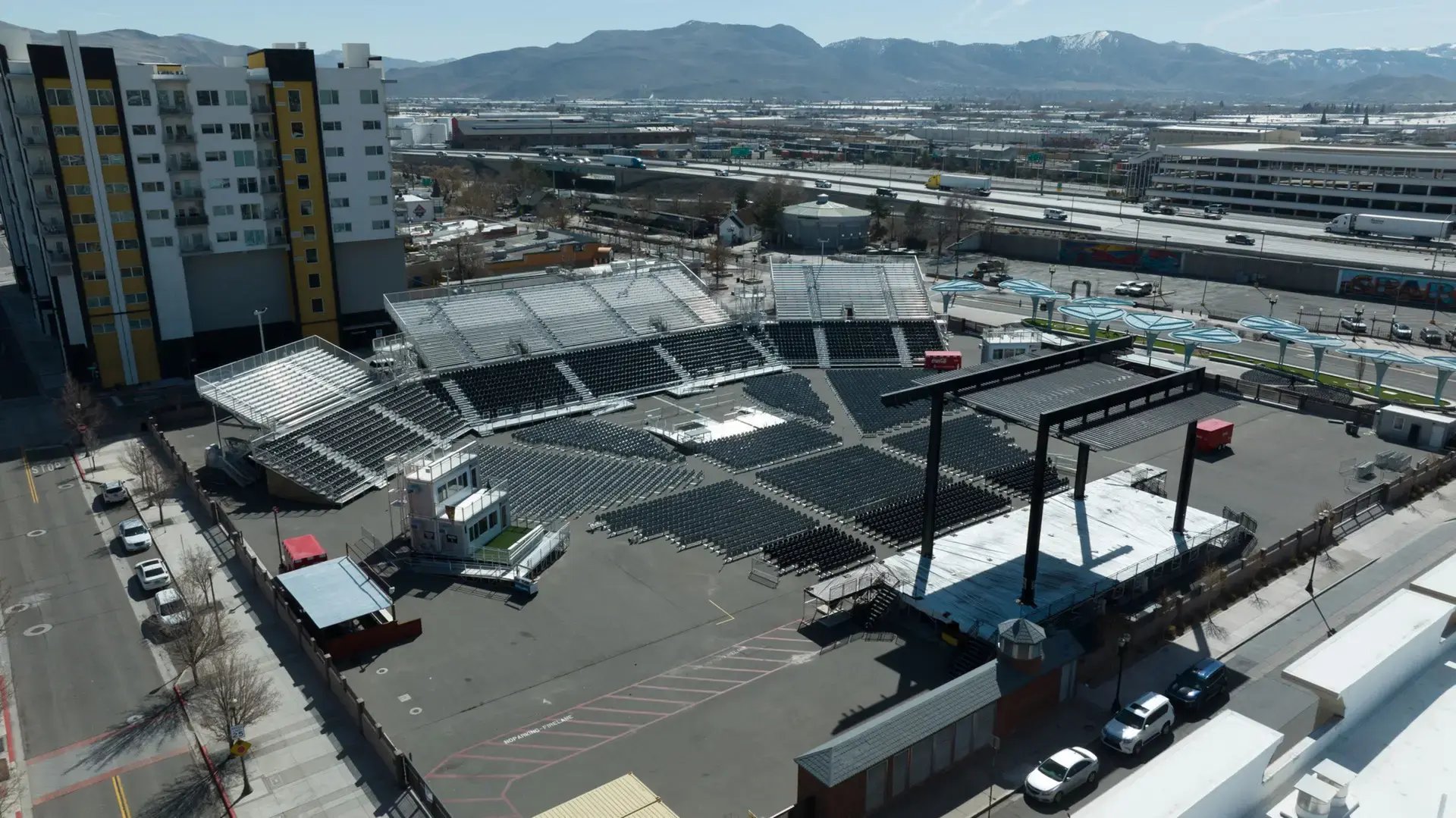 InProduction custom amphitheater with tiered seating and premium tip-up chairs built for the Nugget Casino Resort, positioned adjacent to the casino.
