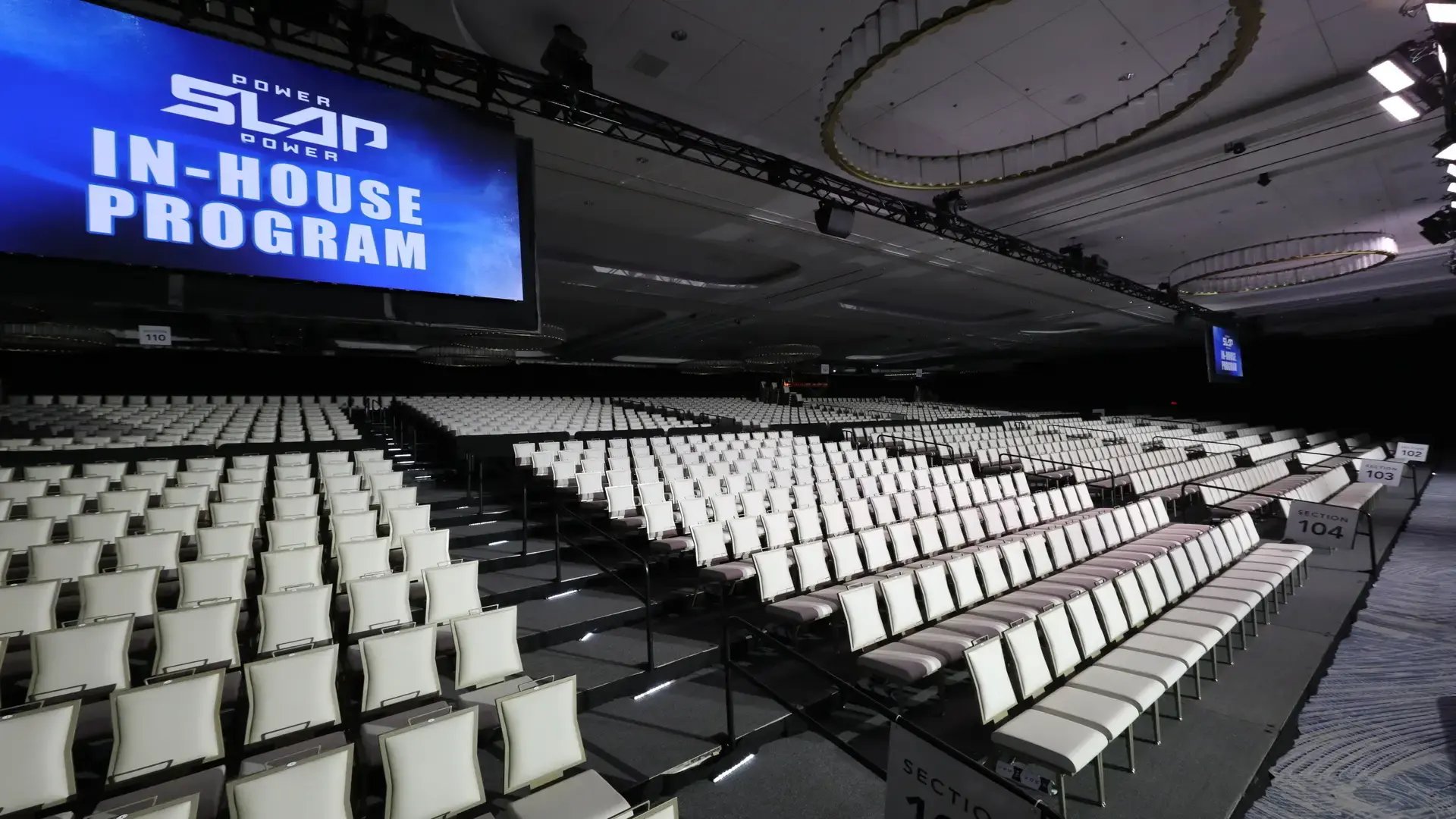 InProduction custom audience risers installed for Power Slap inside a Las Vegas convention venue, enhancing sightlines and creating an intense, immersive viewing environment.
