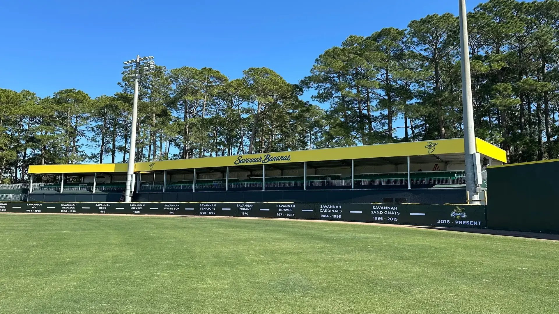 InProduction covered modular seating structure installed for the Savannah Bananas, supporting team operations with branded, weather-protected seating areas.