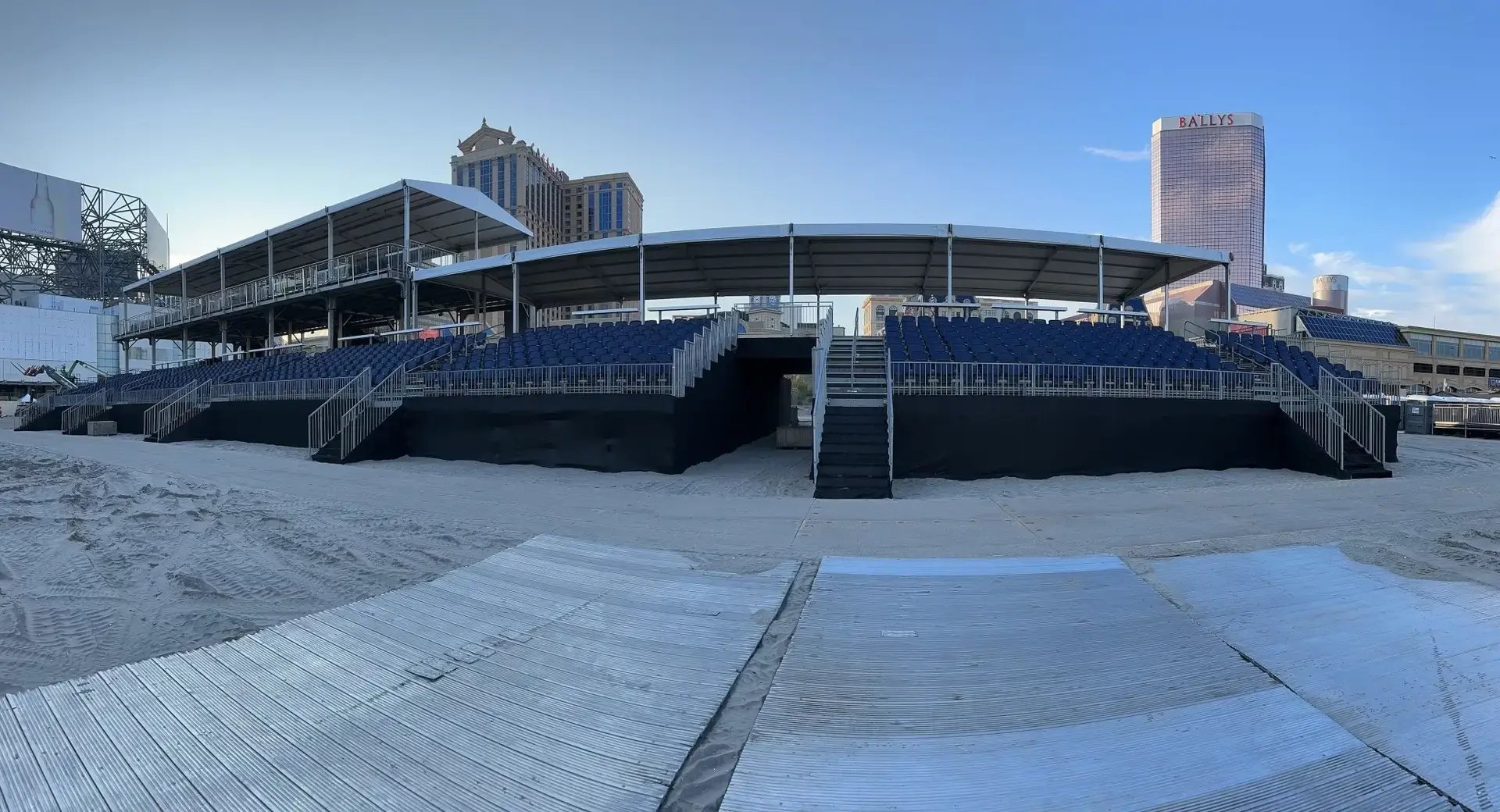 InProduction tiered beach seating and shaded VIP hospitality deck installed at the TidalWave Music Festival, providing clear sightlines and a premium setting for main-stage performances.