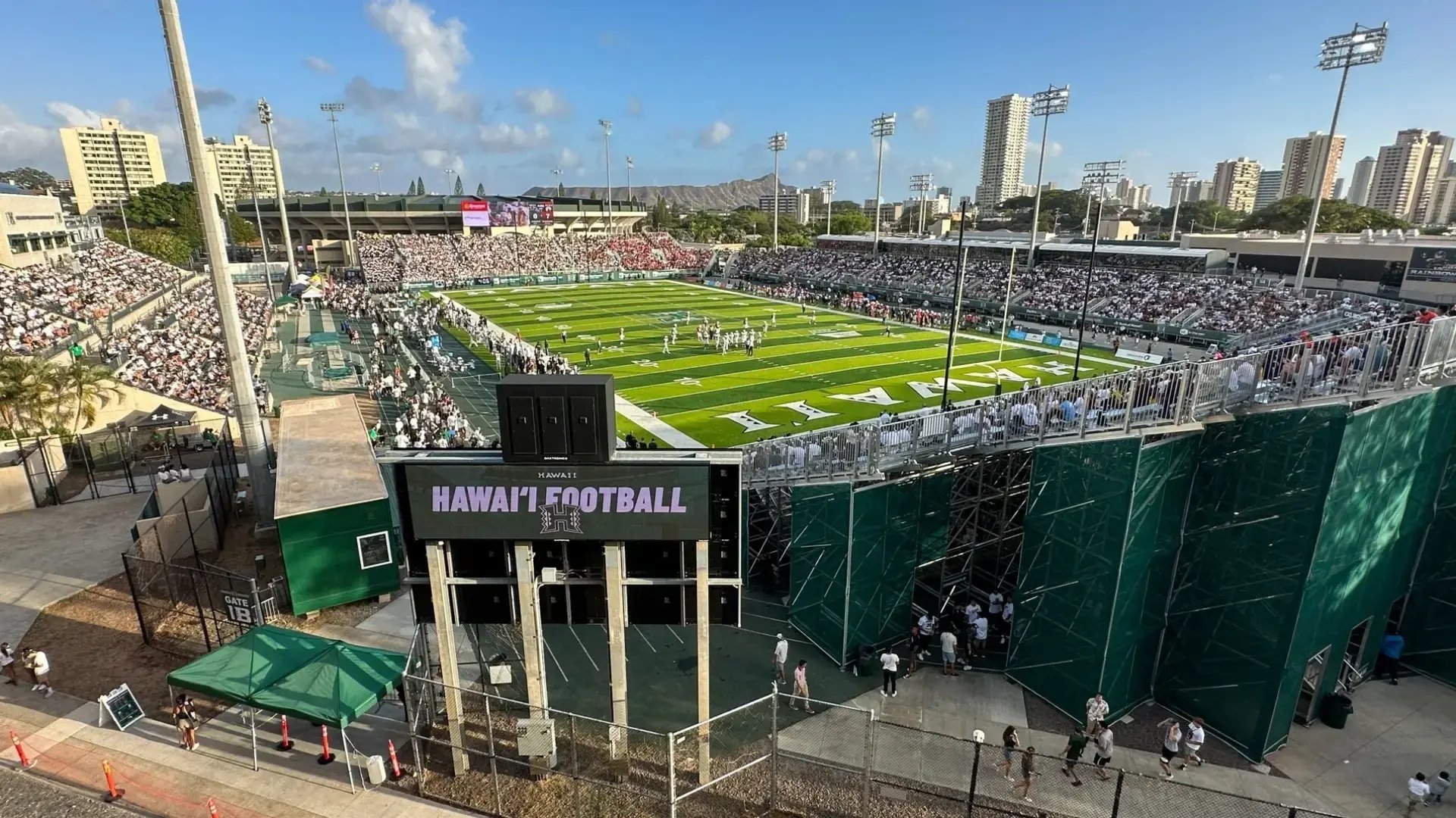 InProduction modular stadium installed for the University of Hawai‘i, featuring 5,500 initial seats with press boxes and VIP hospitality, later expanded by over 7,000 seats to reach 15,000 capacity.