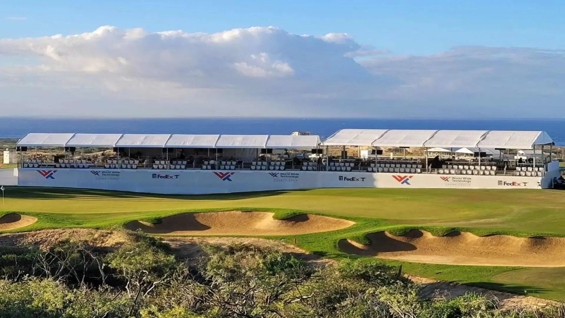 InProduction single-level hospitality structure installed for the World Wide Technology Championship, providing elevated viewing areas with clear sightlines and coastal views.