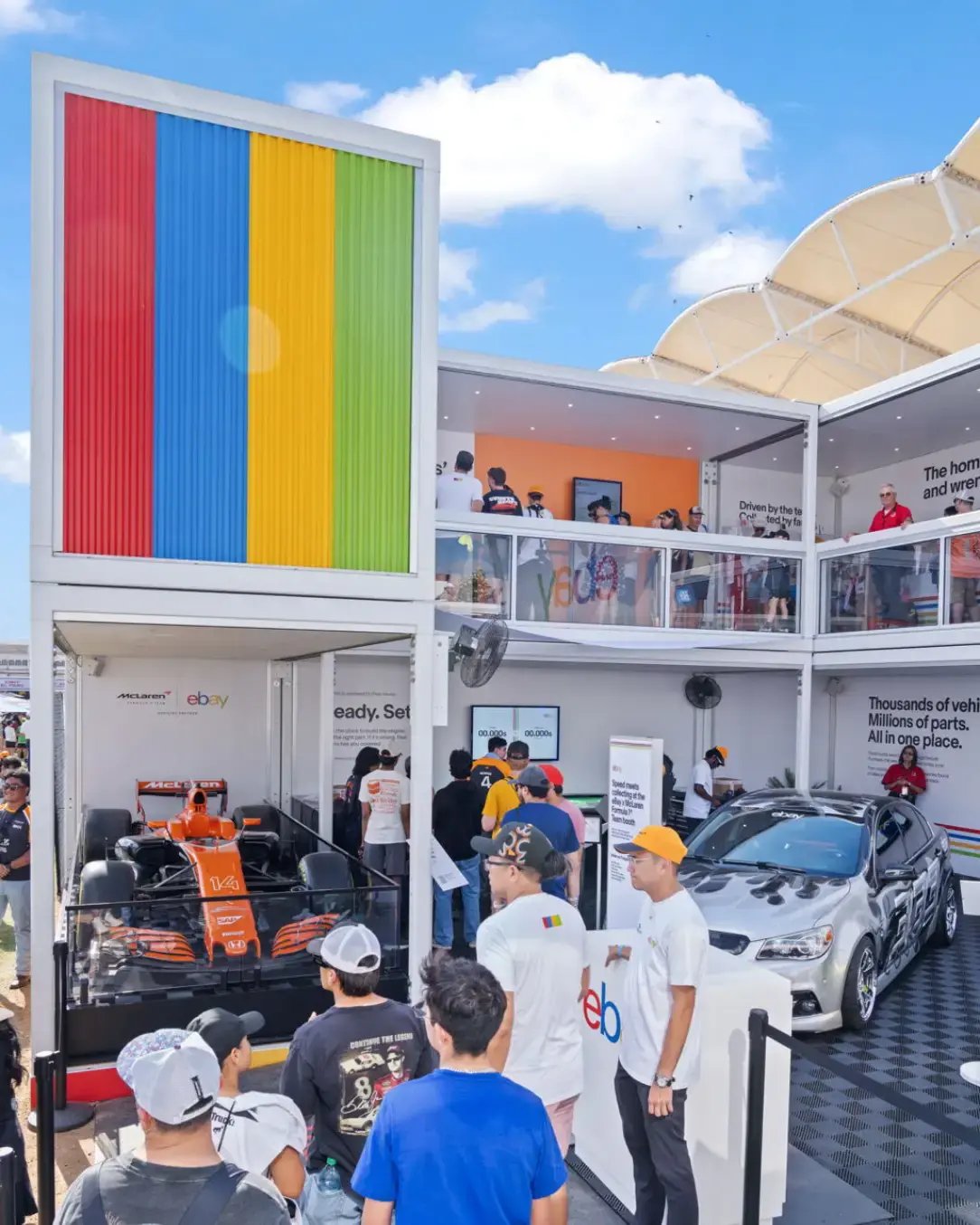 Custom-branded Spacecube activation providing a premium engagement space at a motorsports event.