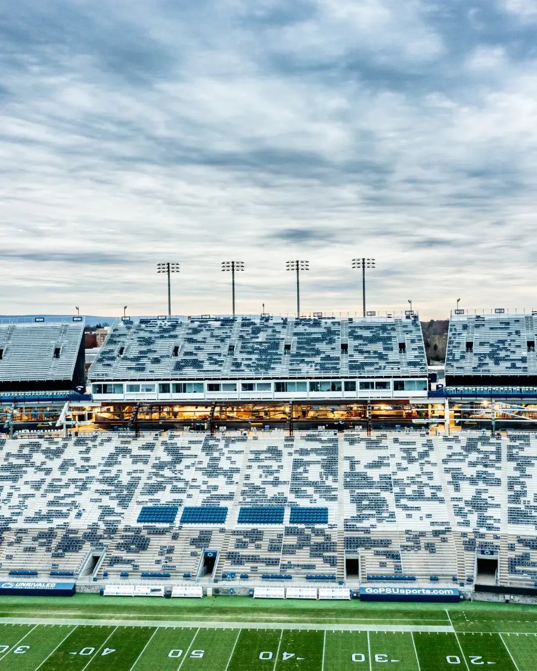 Modular seating added inside an existing stadium to support renovations and expand spectator capacity. 