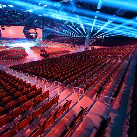 Branded corporate event space with experiential displays and interactive areas.