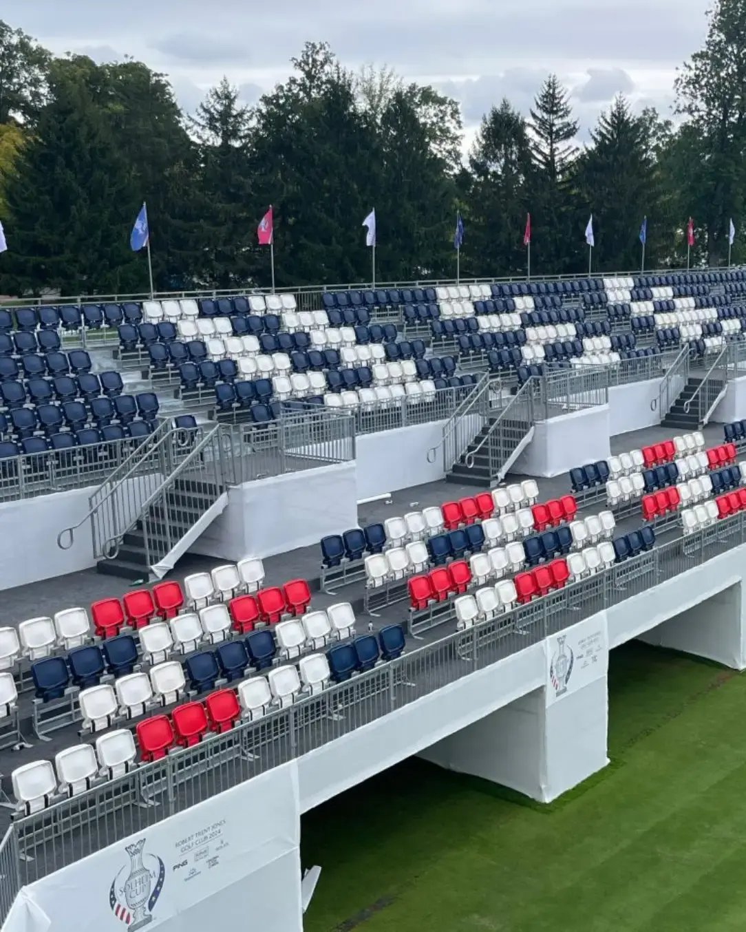 Grandstand seating designed to maximize sightlines and create an immersive, high-energy spectator environment.