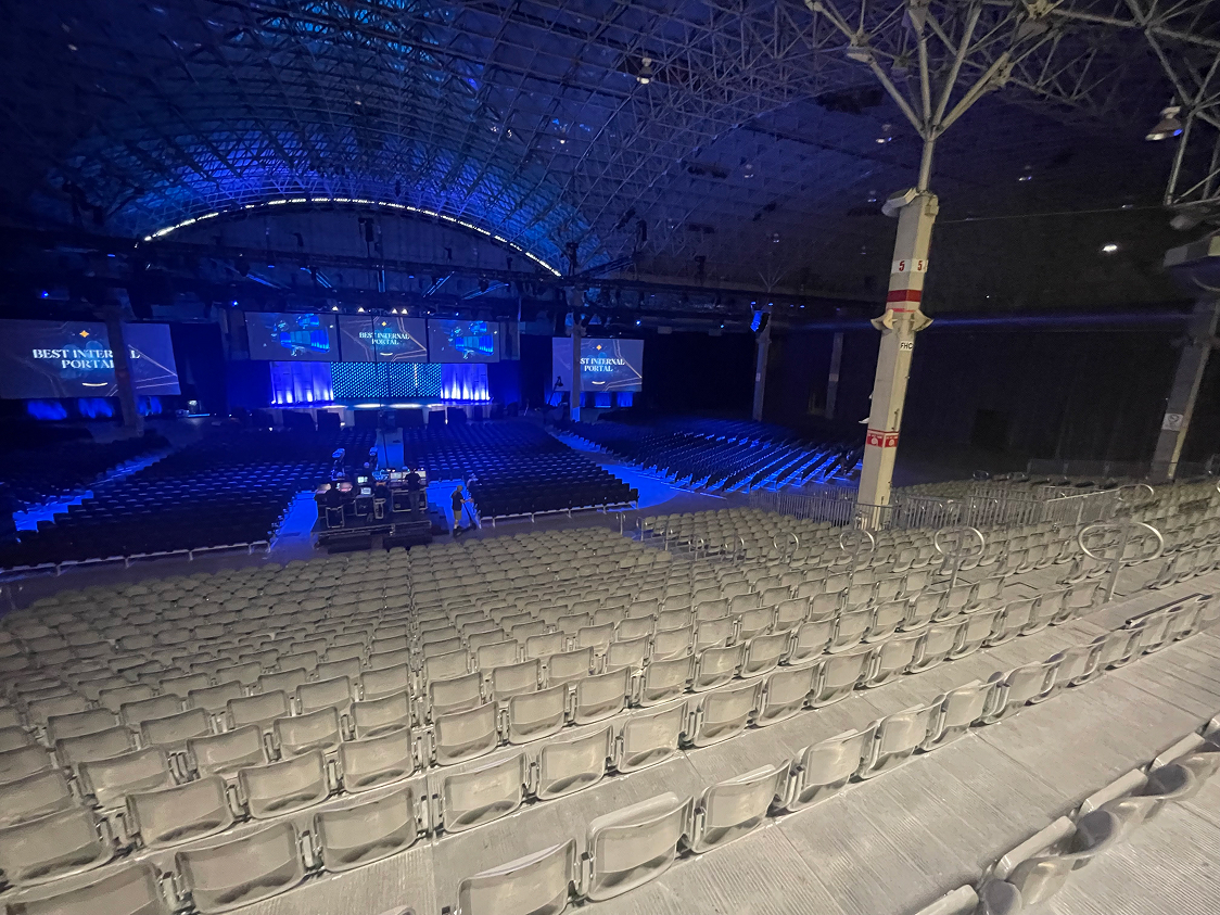 InProduction installed seating with sightlines for stage for corporate event